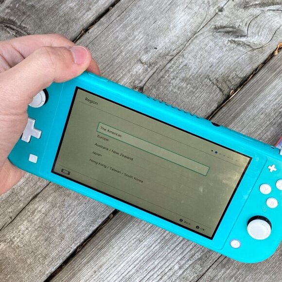 Nintendo Switch Lite Blue Bundle With 2 Games - Assassins Creed & Saints Row - Picture 4 of 7